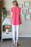 Coral ribbed v-neck top with ruffled sleeves (back)