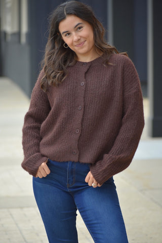 Cozy pullover cable knit sweater with diamond pattern across chest