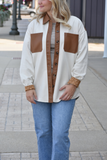 Women’s beige suede shacket with faux leather pockets