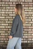 Gray ribbed knit top with drawstring waist