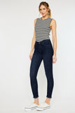 Super dark wash mid rise skinny jean with ankle frays