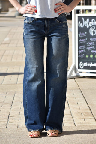 Mid rise dark washed jeans with wide legs