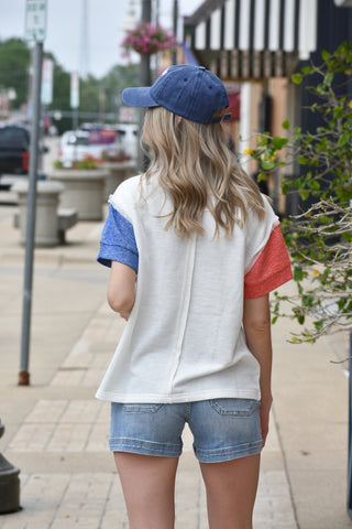 Red white and blue top with large star