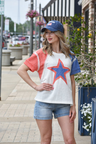 Red white and blue top with large star
