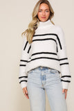 White/black striped turtleneck sweater