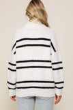 White/black striped turtleneck sweater