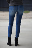 Shayla Mid Rise Distressed Skinny Jeans